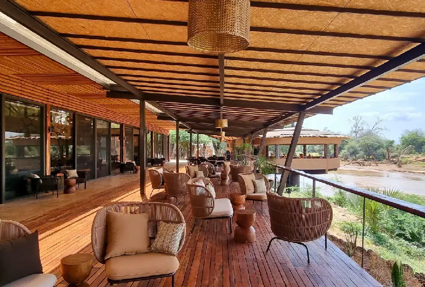 Timber lounge deck at Soroi Samburu overlooking the river