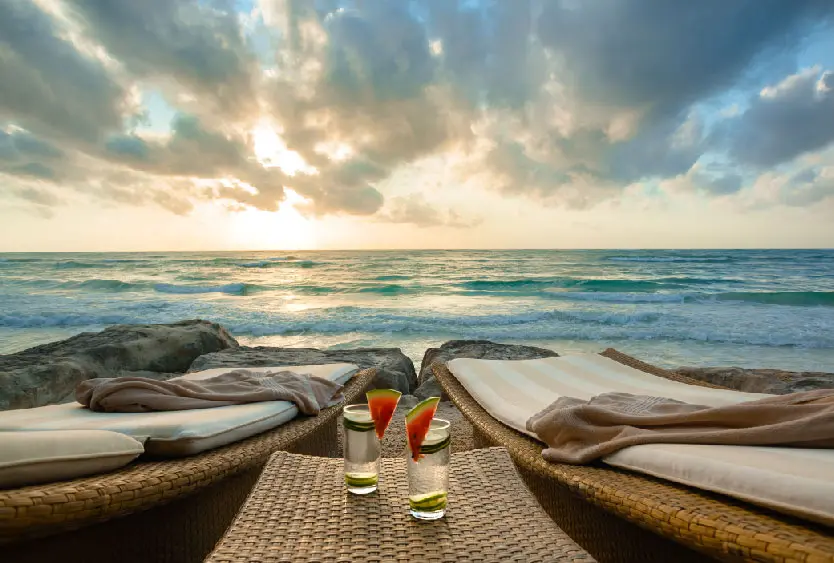 Cushioned daybeds and fresh juices facing the Indian Ocean at first light